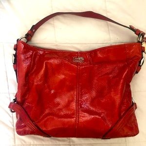 Coach bag - red patent leather in GUC. Wear on bottom shown in photo